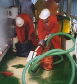 Crew cleaning vessel