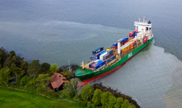 NCL Salten Container Ship Grounds in Norway: A Close Call with a Residential Home