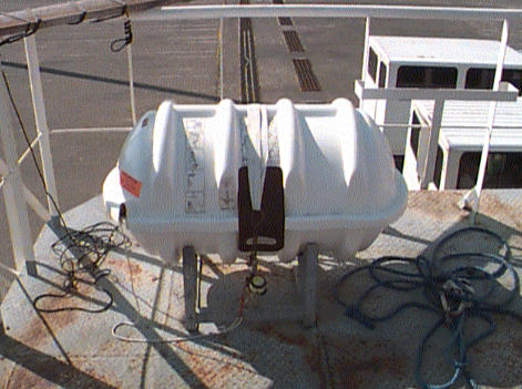 A stored inflatable liferaft
